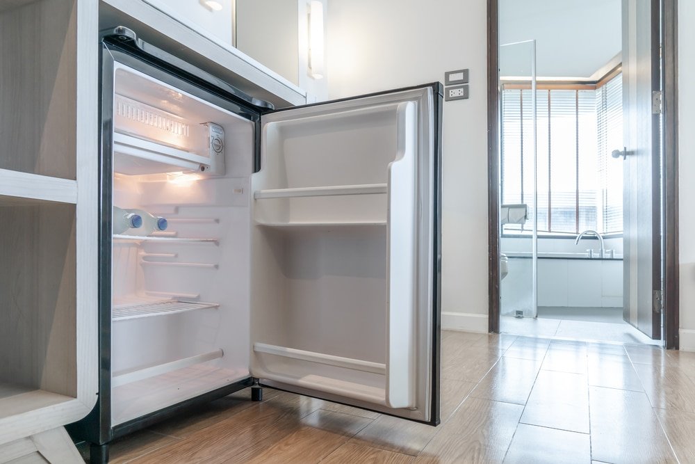 how to hide a mini fridge in a bedroom