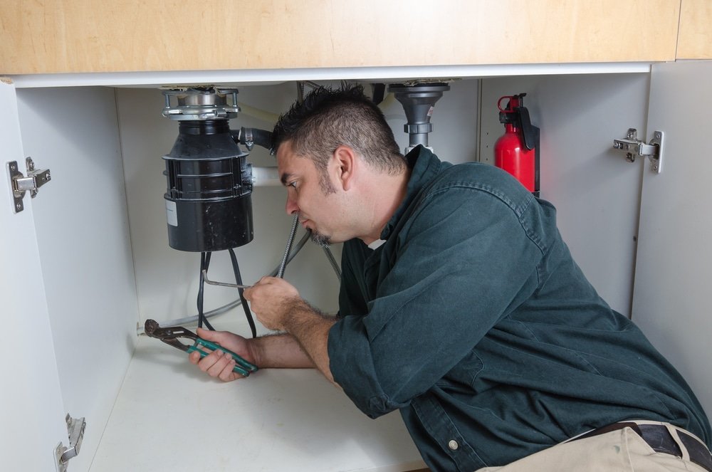 how to remove a waste disposal unit