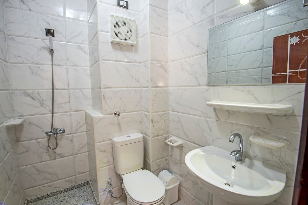 how to stop cold air coming through a bathroom extractor fan