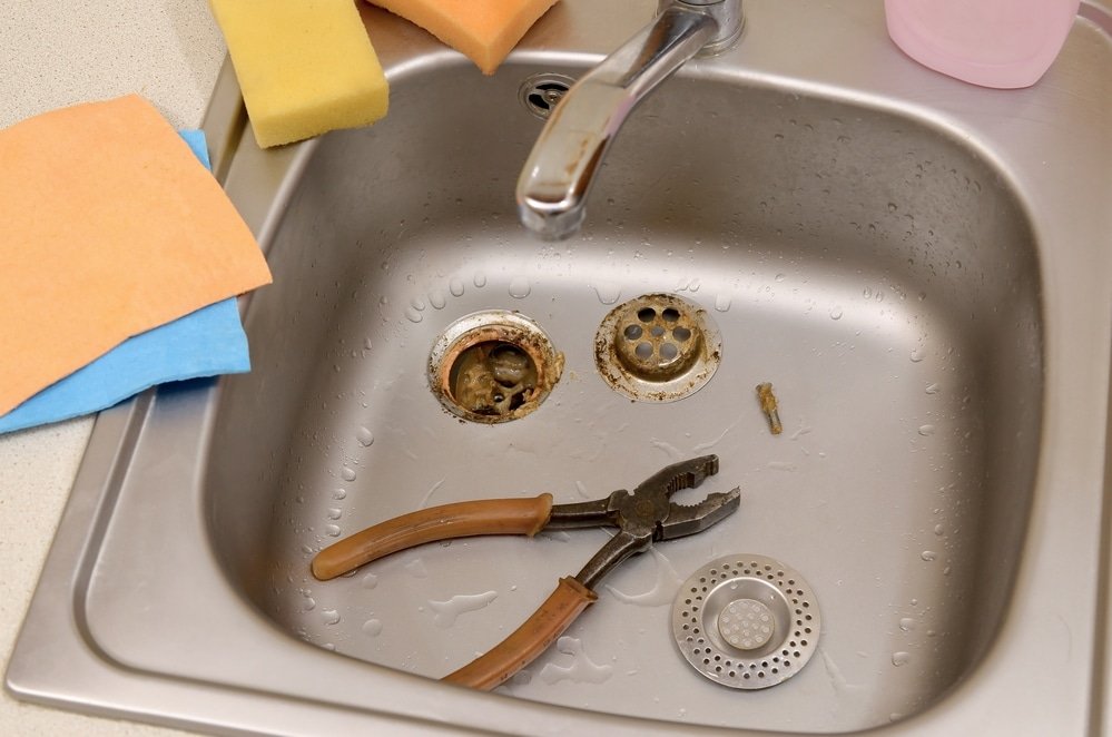 how to unblock a waste disposal unit