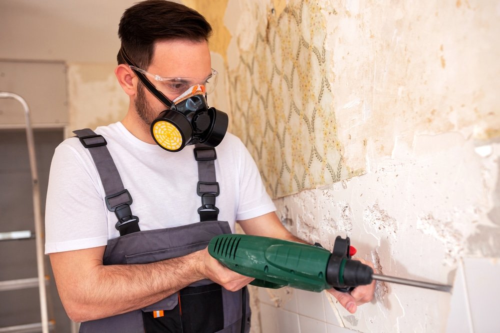 how to use a hammer drill to remove tiles