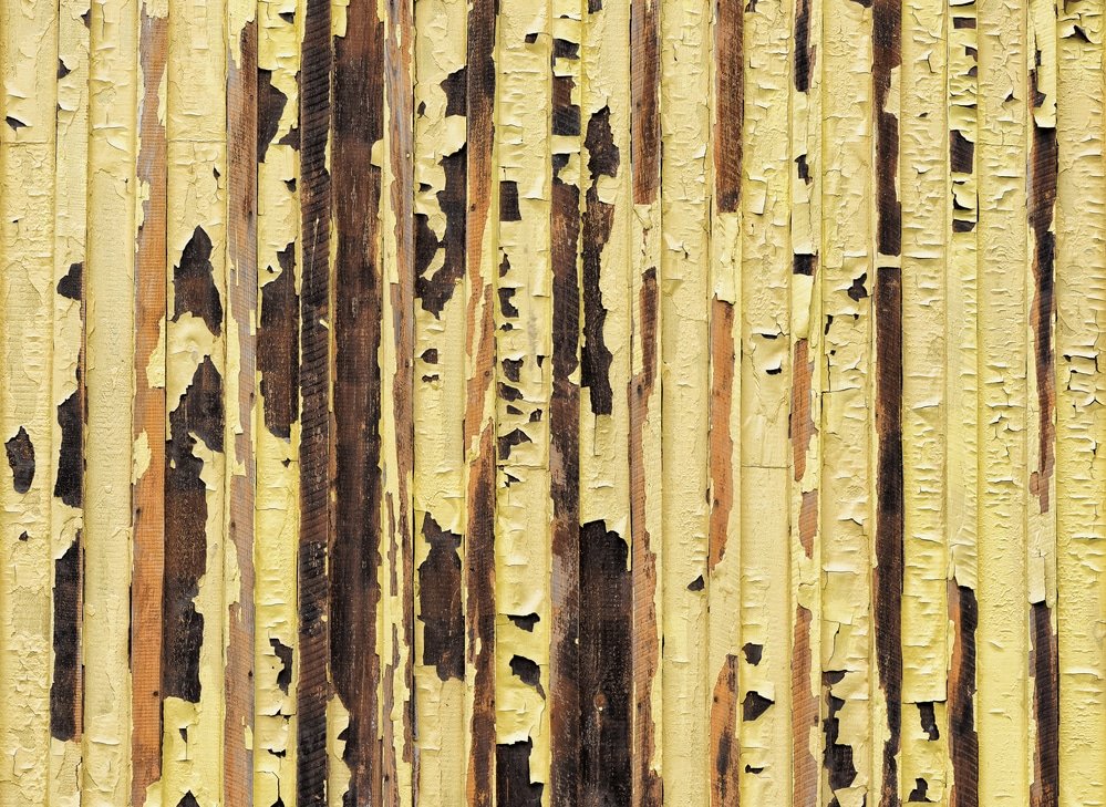 why does paint bubble on exterior wood