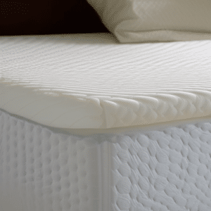 Close up look at the edge of a mattress topper