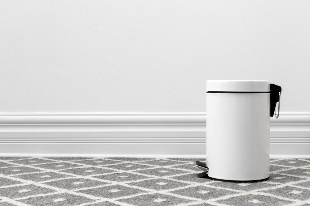 a white trash can