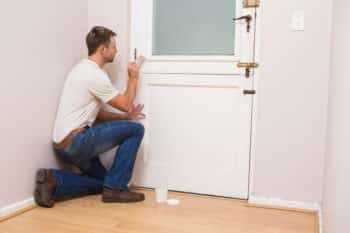 a worker repainting his room