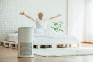 air filtration device and elderly person in white bedroom