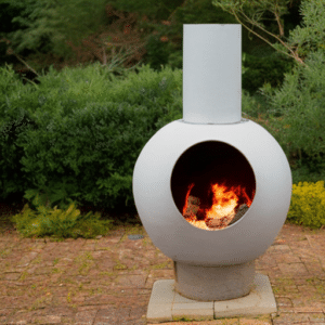burning wood in a white a chiminea