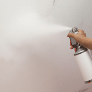 painting wall using sprayer