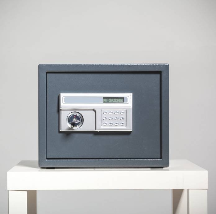 a grey home safe on the table