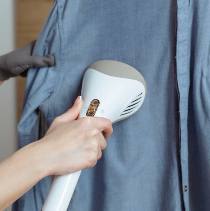 a housewife ironing her shirt