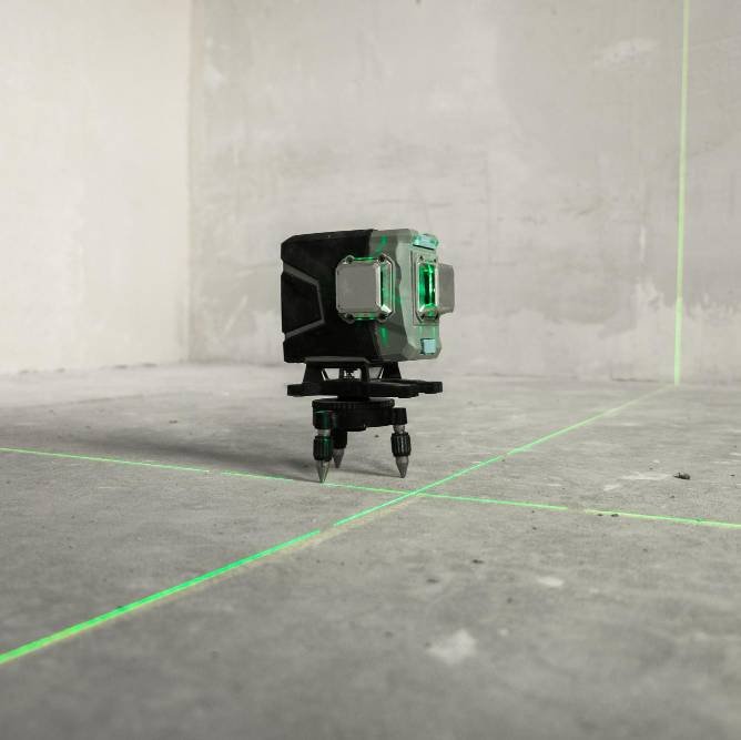 a laser building level with green light