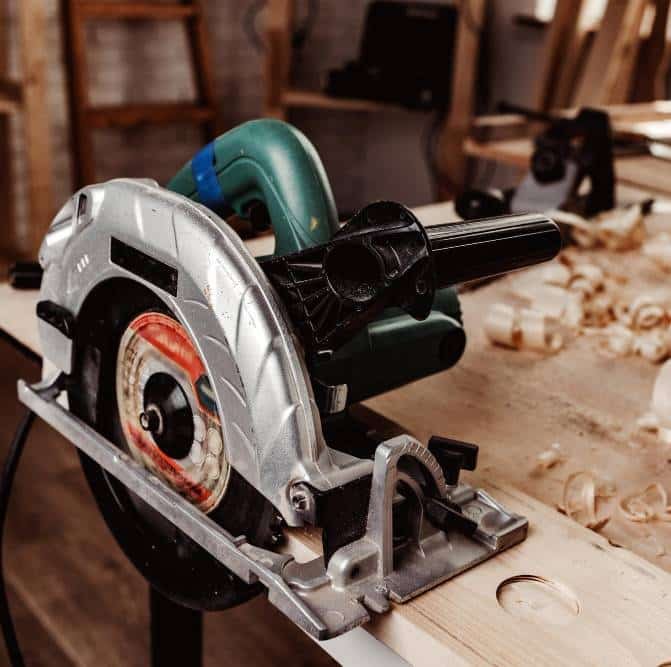 an electrical wheel saw on a working table