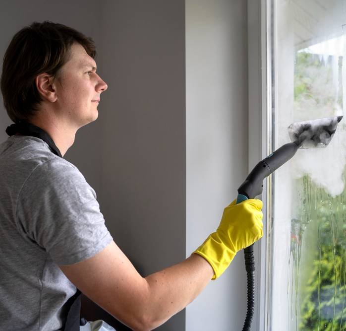 cleaning windows using a steam cleaner