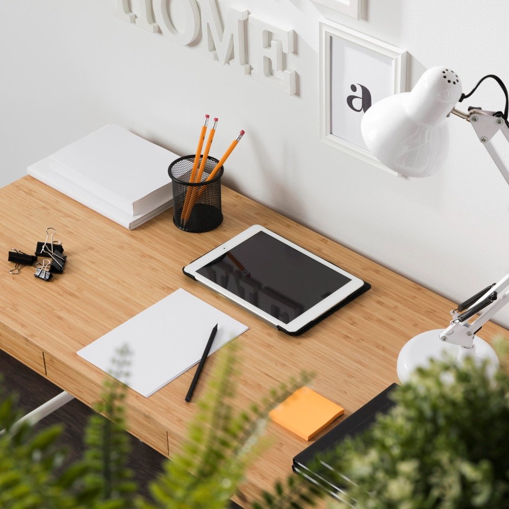 neat and tidy workspace with tablet on floating desk