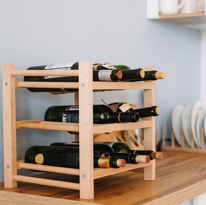wooden wine shelves with bottles